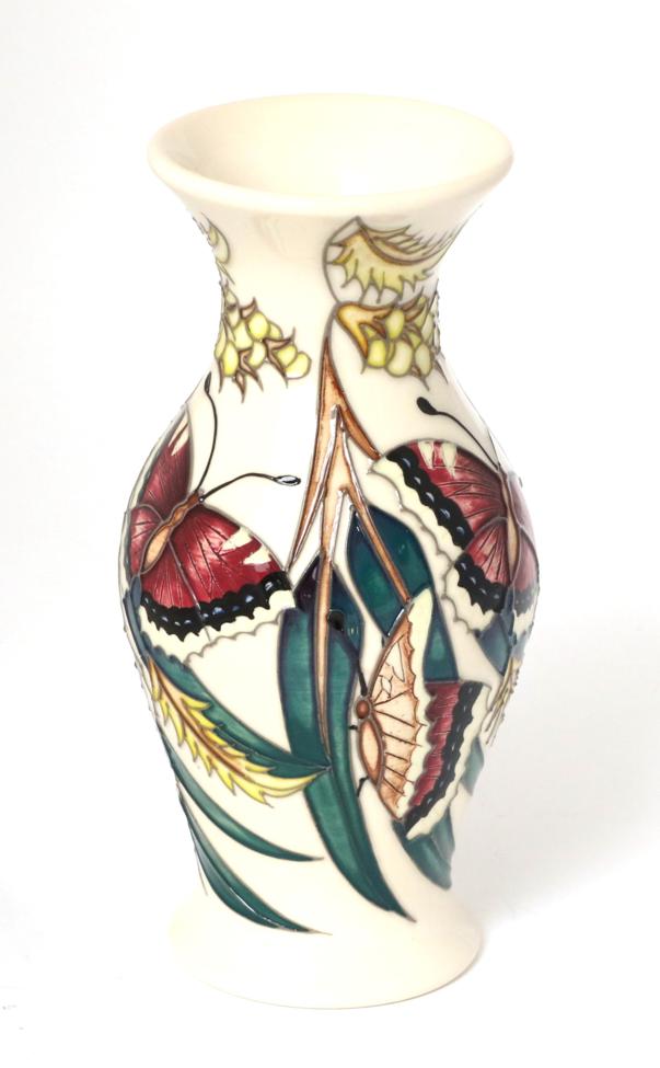 Lot 3 - A Moorcroft pottery vase by Emma Bossons in one of the Butterfly Collection patterns, with...
