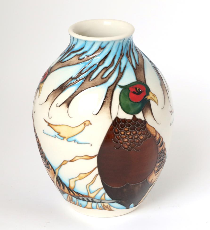 Lot 8 - A modern Moorcroft pottery The Pheasants Of Snow Hollow pattern vase by Emma Bossons, 91/100,...