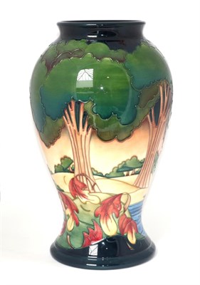 Lot 11 - A Moorcroft pottery vase by Emma Bossons in the Evening Sky pattern, with painted and impressed...