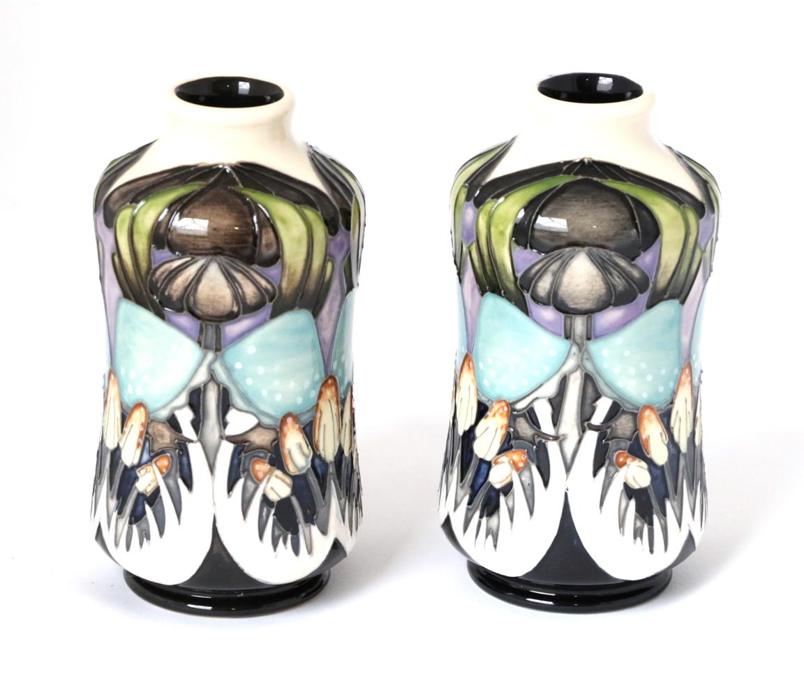 Lot 12 - A pair of Moorcroft pottery vases by Vicky Lovatt in the Indigo Lace pattern, with painted and...