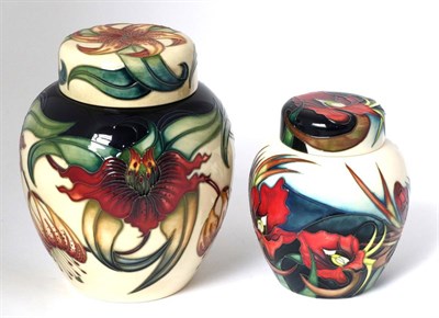 Lot 27 - A Moorcroft pottery ginger jar and cover by Emma Bossons in the Anna Lily pattern, with painted and