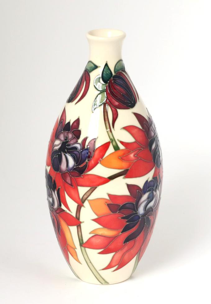 Lot 33 - A Moorcroft pottery TRIAL vase in the Ruby Red pattern, with painted and impressed marks, 24cm