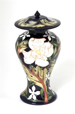 Lot 34 - A Moorcroft pottery vase by Emma Bossons, 11/35, with painted and impressed marks, 22cm