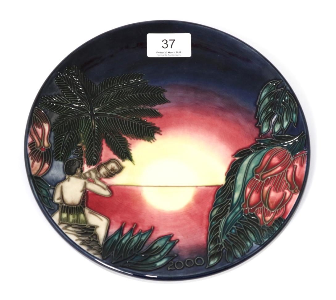 Lot 37 - A Moorcroft pottery plate in the Birth of Light 2000 year plate pattern, 278/2000, with painted and