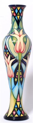 Lot 52 - A Moorcroft pottery Dutch Delight 138/12 vase designed by Sian Leeper, 31cms high (boxed)