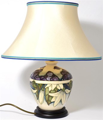 Lot 57 - A Moorcroft table lamp in the Juneberry pattern by Anji Davenport, 20cm high (excluding fitting)