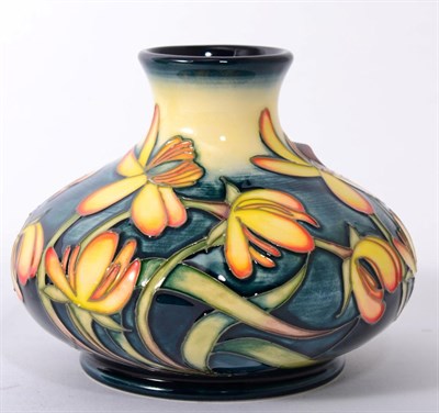 Lot 68 - A Moorcroft pottery Celandine 32/5 vase limited edition 18/500 designed by Emma Bossons, 11cms high