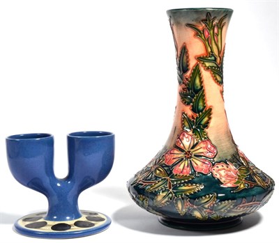 Lot 74 - A Moorcroft vase, dated 97; and a Troika double egg cup (2)