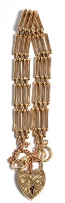 Lot 80 - A 9 carat gold gate link bracelet, with a 9 carat gold foliate engraved padlock clasp, length 18cm