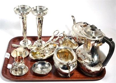 Lot 95 - A small group of silver comprising a pair of bud vases (weighted); a miniature four piece condiment
