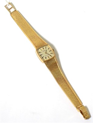 Lot 111 - A 9 carat Tissot wristwatch