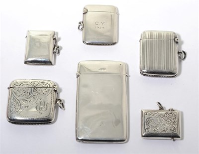 Lot 125 - A silver vesta case, William Hair Haseler, Birmingham 1913, with striped engraving; two further...