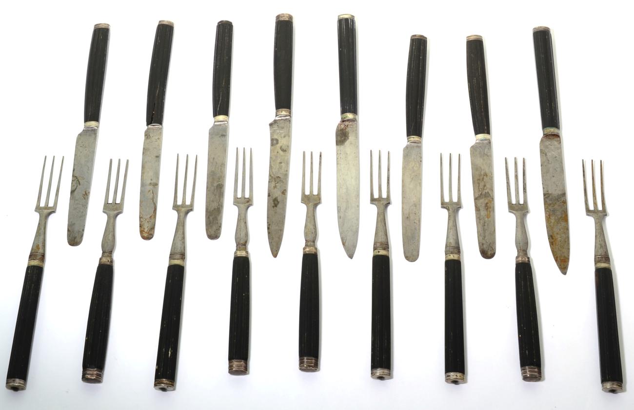 Lot 126 - A composite part set of 18th century French steel and ebony fruit knives and forks, various...