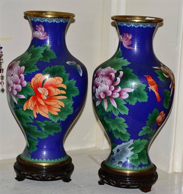Lot 140 - A pair of large cloisonne vases on hardwood stands