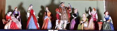 Lot 158 - Nine Royal Doulton figures comprising Henry VIII and his six wives, Mary Queen of Scots and...