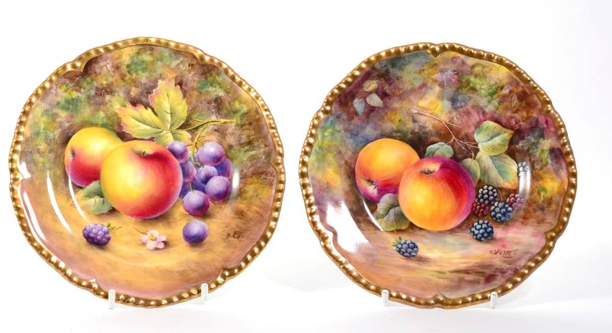 Lot 168 - Two Royal Worcester fruit painted plates, one signed B Cox, the other signed J Skerrett, 15cm each