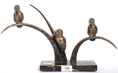 Lot 186 - An Art Deco bronze model of three Kingfishers on a marble base