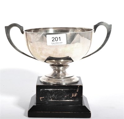 Lot 201 - A silver twin handled trophy cup, Deakin & Francis, Birmingham 1922, on ebonised plinth base,...