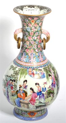 Lot 217 - A Chinese famille rose twin handled vase decorated with figures