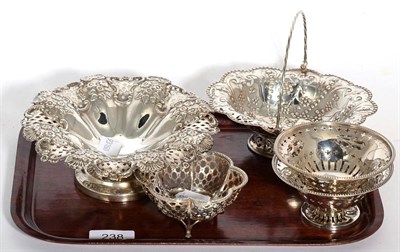 Lot 238 - A pair of Walker & Hall pierced silver bon bon dishes, a pierced silver basket by Walker &...