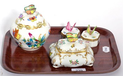 Lot 239 - Herend porcelain; four butterfly applied and decorated covered boxes