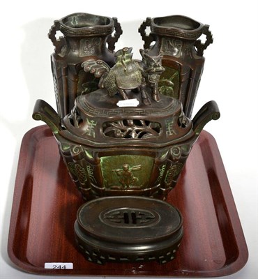 Lot 244 - A Chinese bronze garniture comprising a covered censor on stand surmounted by a dragon and a...