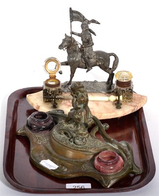 Lot 256 - A patinated metal figural desk standish in the Art Nouveau taste, together with another figural...