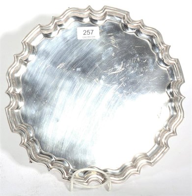 Lot 257 - A shaped circular silver salver, Walker & Hall, Sheffield 1913, 31cm diameter, 26.5ozt