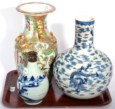 Lot 258 - A 19th century Chinese blue and white bottle vase (a.f.), a Canton famille rose vase (a.f.) and...