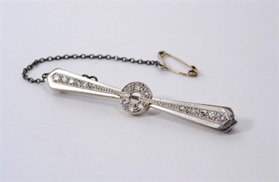 Lot 271 - An Art Deco diamond bar brooch, a central disk set with eight-cut diamonds to a tapering...