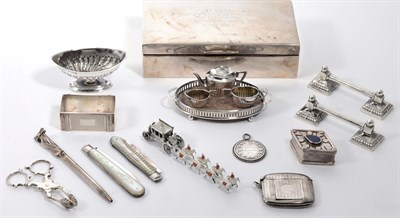 Lot 285 - A silver cigarette case; combination vesta and stamp holder; fruit knives; knife rests; Tiffany...