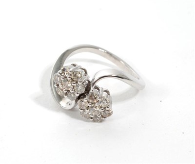 Lot 302 - An 18 carat white gold diamond double cluster ring, two clusters of seven round brilliant cut...