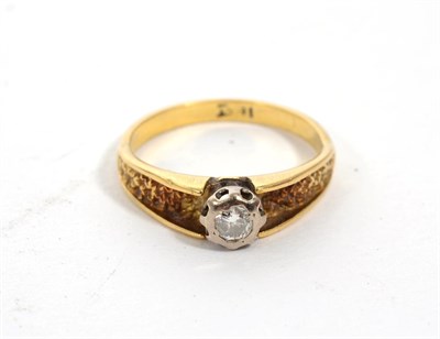 Lot 308 - A solitaire diamond ring, a round brilliant cut diamond in an illusion setting, to carved...