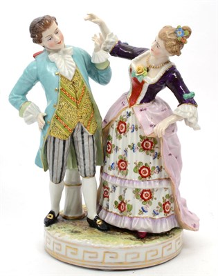 Lot 313 - A Vienna porcelain figure group of a courting couple, 20cms high