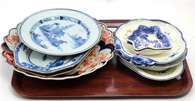 Lot 338 - Two 18th century Chinese rectangular dishes; a tin glaze plate (a.f.); an Imari charger; three...