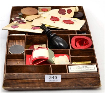 Lot 345 - A quantity of wax desk seals and a small writing box