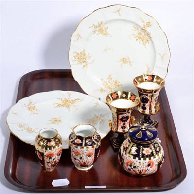 Lot 352 - Seven pieces of Royal Crown Derby comprising of a pair of plates, a pair of Imari urn formed vases