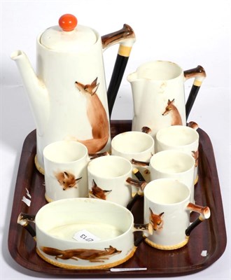 Lot 355 - A Royal Doulton Reynard the Fox pattern coffee set comprising coffee pot, cream jug, sucrier...