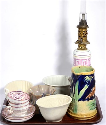 Lot 357 - Victorian items including a Majolica jug, pottery pie and jelly molds, oil lamp etc