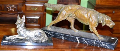 Lot 370 - A silvered spelter model of an Alsatian on a marble base and a spelter model of an Irish Setter...