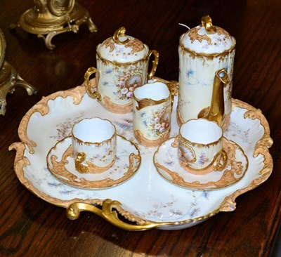 Lot 372 - A French Limoges porcelain tete a tete service with tray, circa 1900