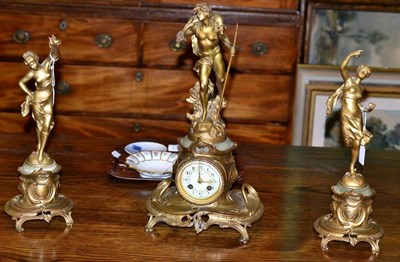 Lot 373 - An Art nouveau gilt spelter figural clock garniture, dial with retailers signature Johnson,...