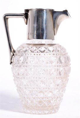 Lot 381 - A silver mounted cut glass water jug