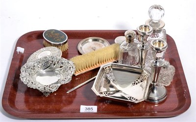 Lot 385 - A group of silver items, including: various silver topped glass jars and bottles; a silver and...