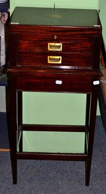 Lot 397 - A mahogany cased canteen on stand containing a Viners service of flatware for twelve place settings