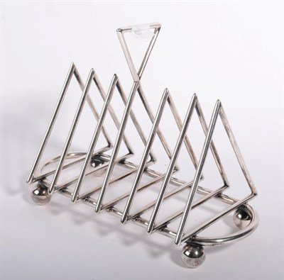 Lot 399 - A silver plated toast rack, possibly designed by Christopher Dresser, of triangular form, unmarked