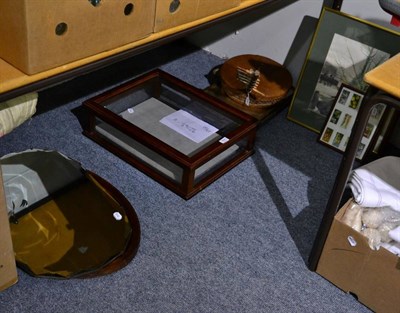 Lot 1041 - A mahogany table top display cabinet; three various trays; two wall mirrors and two framed sets...