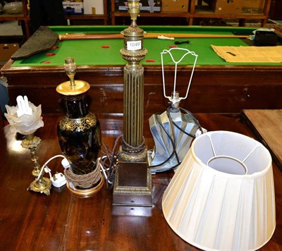 Lot 1049 - A group of five modern table lamps