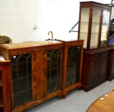 Lot 1080 - A modern glazed bookcase cabinet, together with two display cases