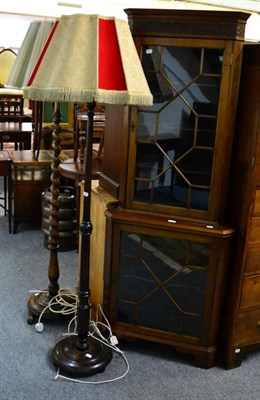 Lot 1083 - Two standard lamps and a glazed standing corner cupboard (3)